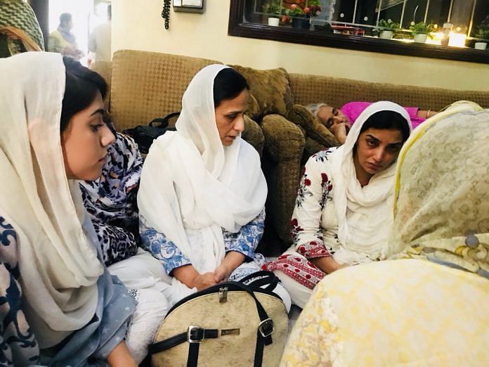 Relatives of deceased Sabika sheikh at her home in Karach