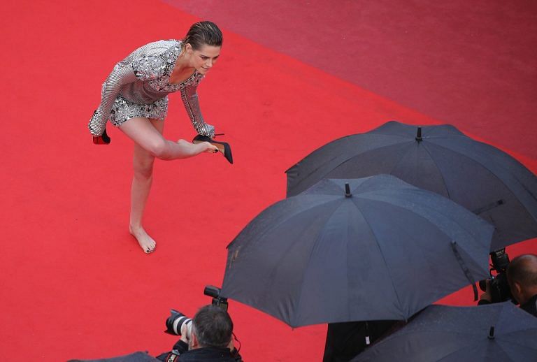 Kristen Stewart shedding her heels on the Cannes red carpet was a tall act