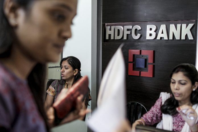 Women employees work in an HDFC Bank Ltd. branch in Mumbai, India | Bloomberg