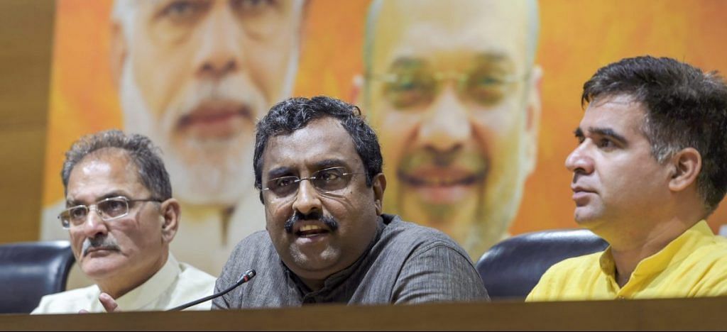 BJP in-charge for Jammu and Kashmir Ram Madhav, flanked by the state Dy Chief Minister Kavinder Gupta and BJP state chief Ravinder Raina | PTI