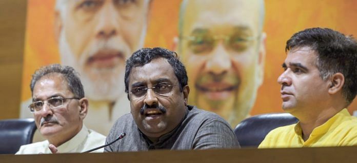 BJP in-charge for Jammu and Kashmir Ram Madhav, flanked by the state Dy Chief Minister Kavinder Gupta and BJP state chief Ravinder Raina | PTI