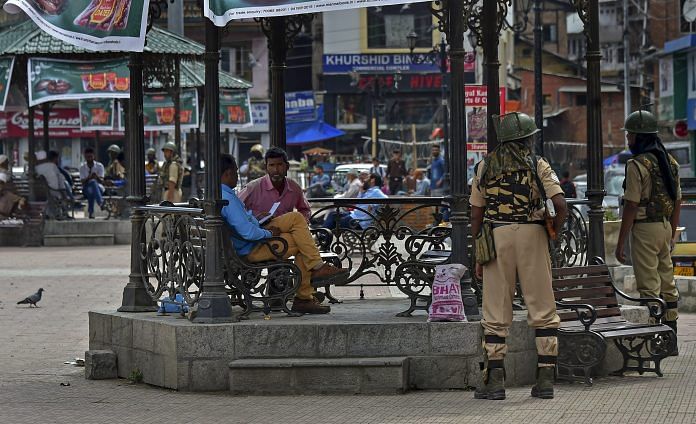Security personnel stand guard at Lal Chowk in Srinaga