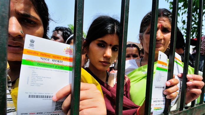 Women line up at an Aadhar camp | Getty Images