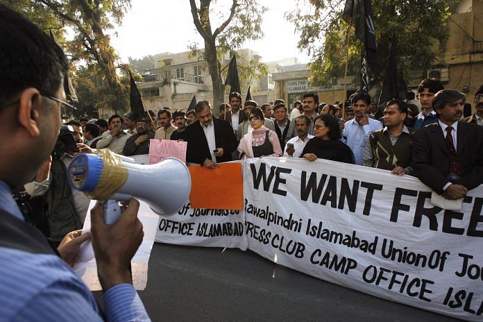(Representative image) Journalists protest against media restrictions, outside the Islamabad Press Club, on 20 November 2007