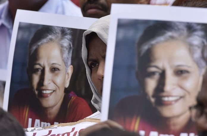 People stage a protest against the killing of senior journalist Gauri Lankesh, Bengaluru | Arijit Sen/Hindustan Times via Getty Images