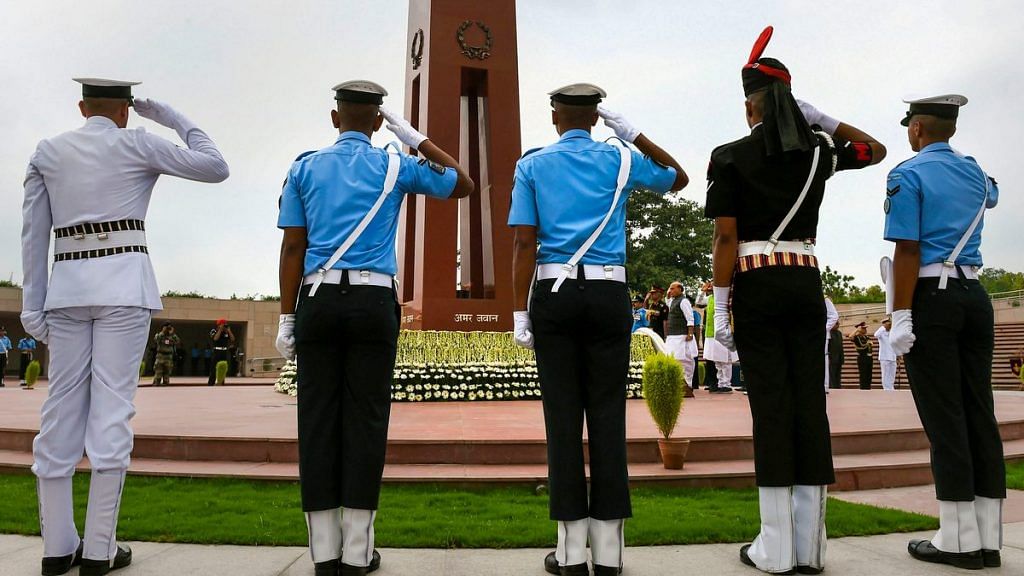Tri-services personnel pay homage at the National War Memorial on the occasion of Kargil Diwas, in New Delhi, on 26 July 2019 | Atul Yadav | PTI Photo