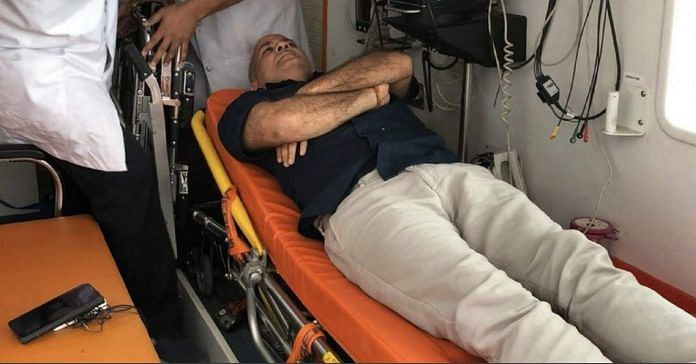 Manish Sisodia being carried to the hospital after his health deteriorated at LGs office
