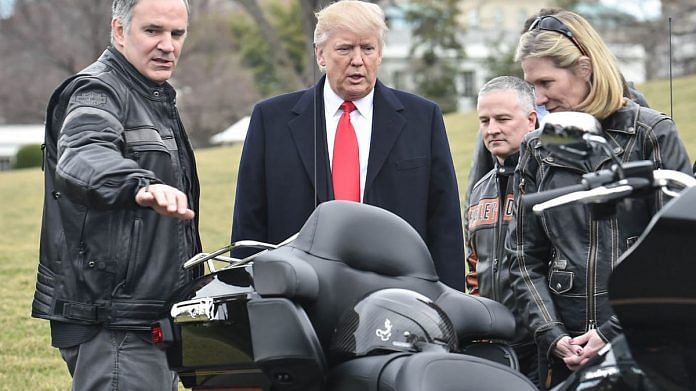 US President Donald Trump with a Harley Davidson bike