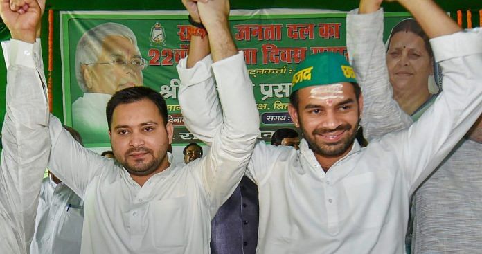 RJD leaders Tejashwi Yadav (L) with Tej Pratap attend the 22nd Foundation Day of Rashtriya Janata Dal, in Patna | PTI