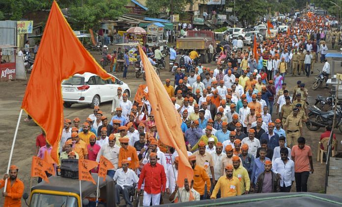 Protestors from the Maratha community take part in a rally demanding reservation, in Karad, Maharashtra | PTI