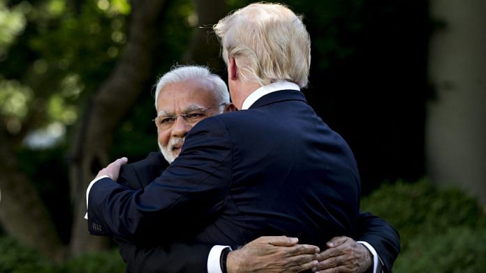 Narendra Modi hugs U.S. President Donald Trump in Washington, 2017 | Andrew Harrer/Bloomberg