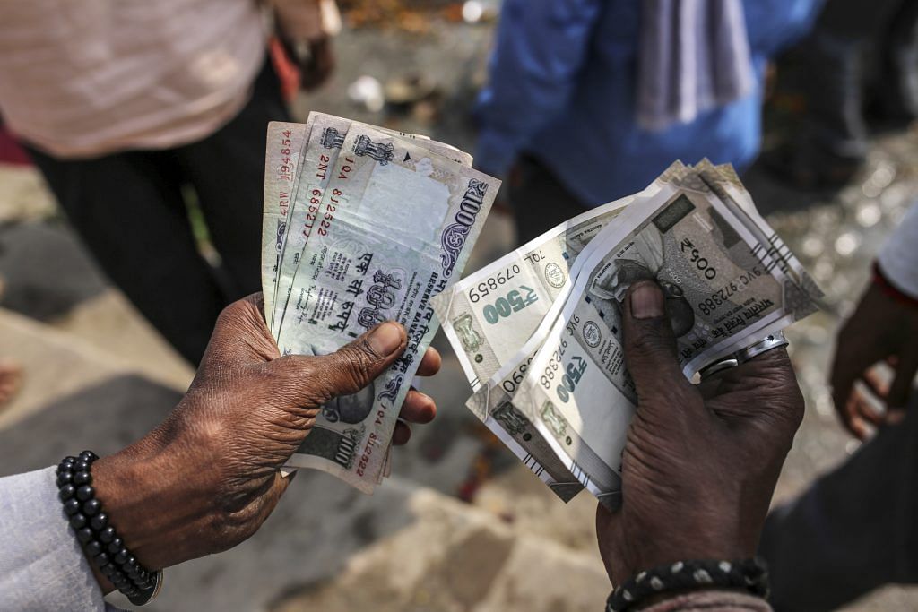 The rupee hit a record low last Thursday to cross 69 to a dollar | Dhiraj Singh/Bloomberg