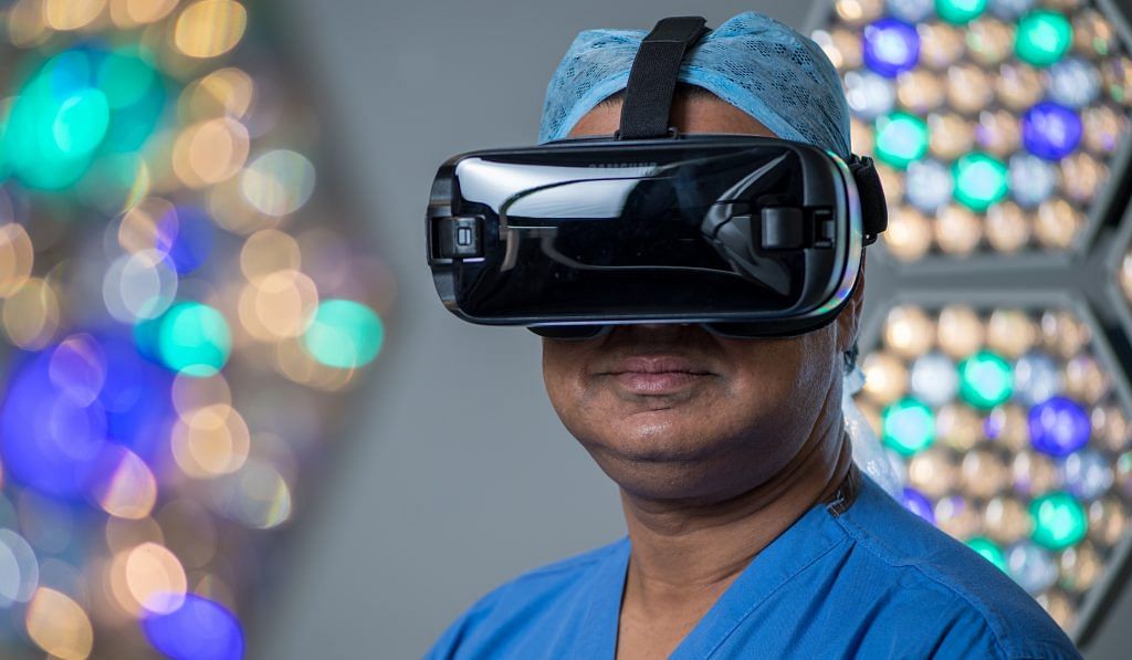 A surgeon using a VR headset at the Royal London Hospital | Chris J. Ratcliffe/Bloomberg