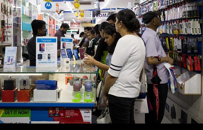 The rise in purchases of smartphones, TVs and other goods have made electronics India’s second-biggest import item after oil | SeongJoon Cho/Bloomberg