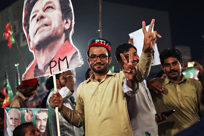 Supporters of Imran Khan, chairman of Pakistan Tehreek-e-Insaf | Asad Zaidi/Bloomberg