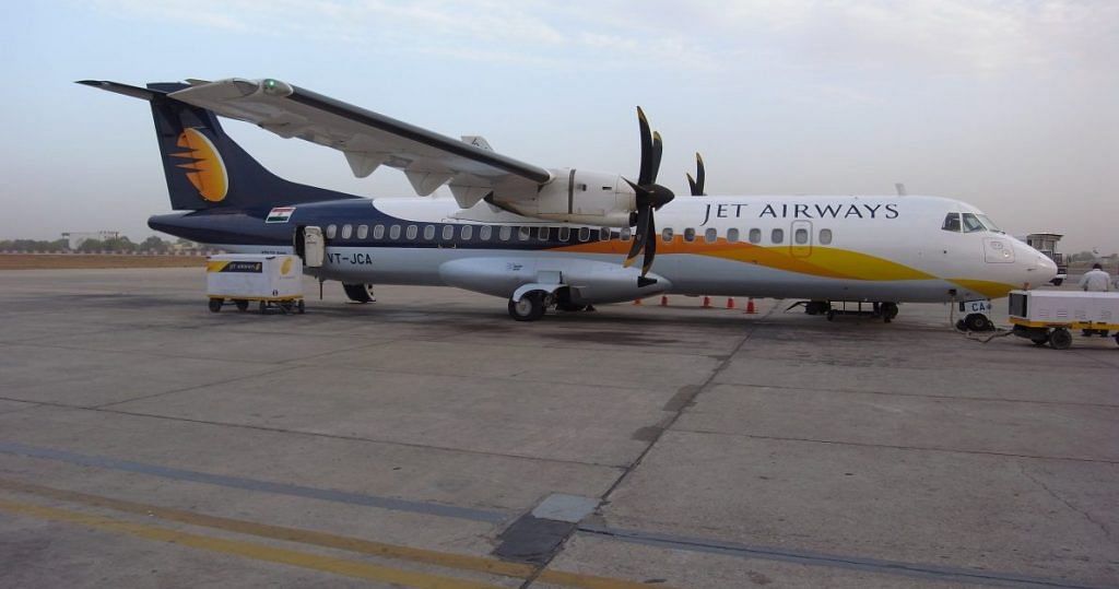 A Jet Airways aircraft at an airport. Under the UDAN scheme, the government has reached out to private airlines to operate between smaller cities | Commons