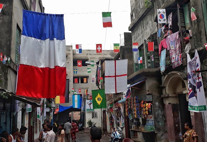 A street in Kolkata decked with flags during World Cup season | Sandip Roy/ThePrint