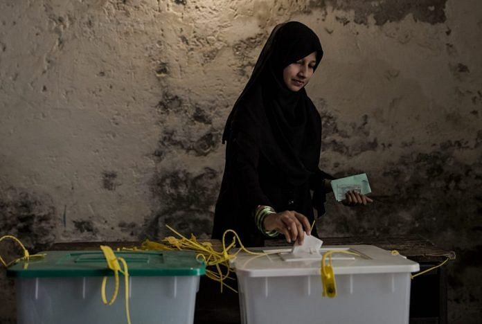 File photo of a woman casting her vote in Lahore, Pakistan | Daniel Berehulak/Getty Images