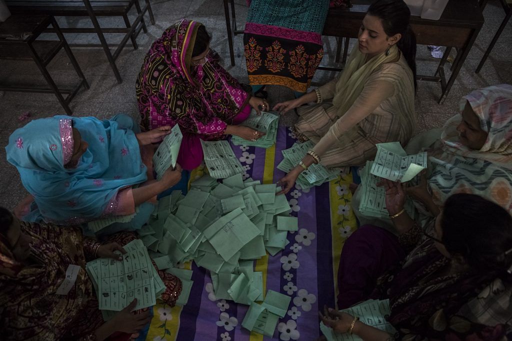 File photo of Pakistani election workers counting ballots in Lahore | Daniel Berehulak/Getty Images