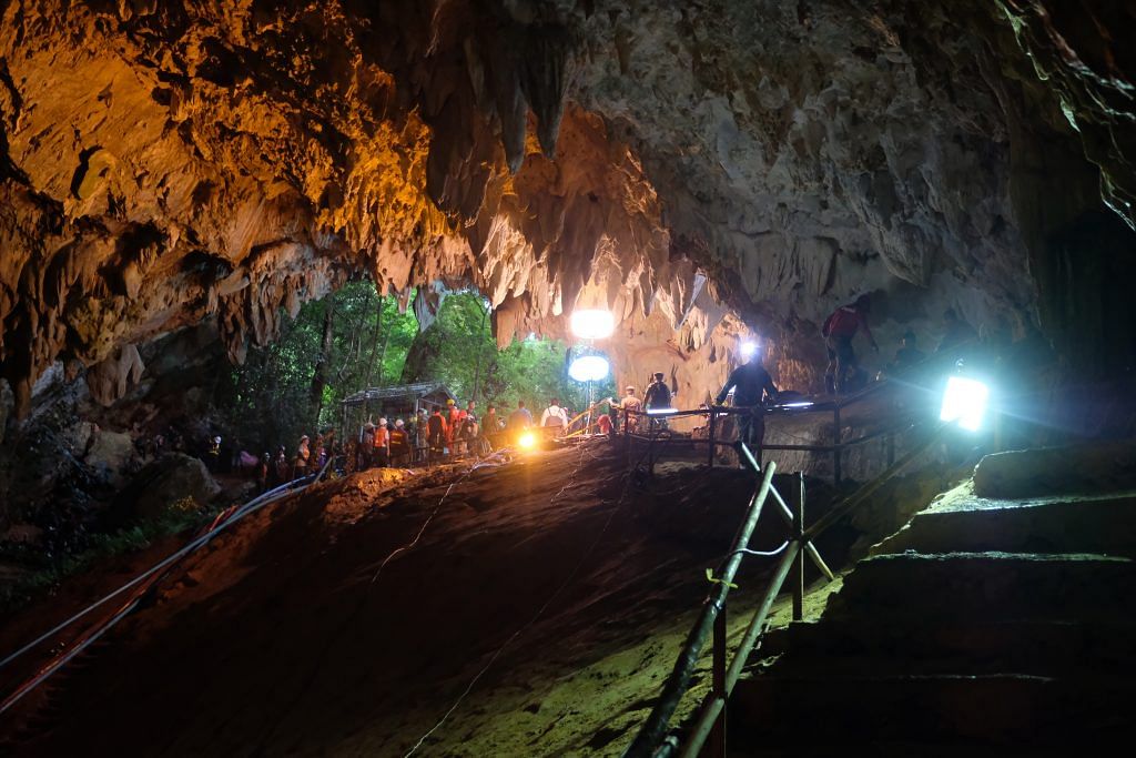 Rescuers install a water pump inside Tham Luang Nang Non cave on June 28, in Thailand | Linh Pham/Getty Images