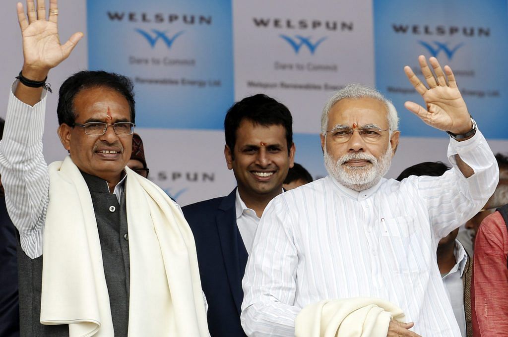 File photo of Narendra Modi and Shivraj Singh Chouhan in Madhya Pradesh | Vivek Prakash/Bloomberg
