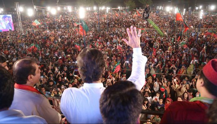 Imran Khan and his party at a rally