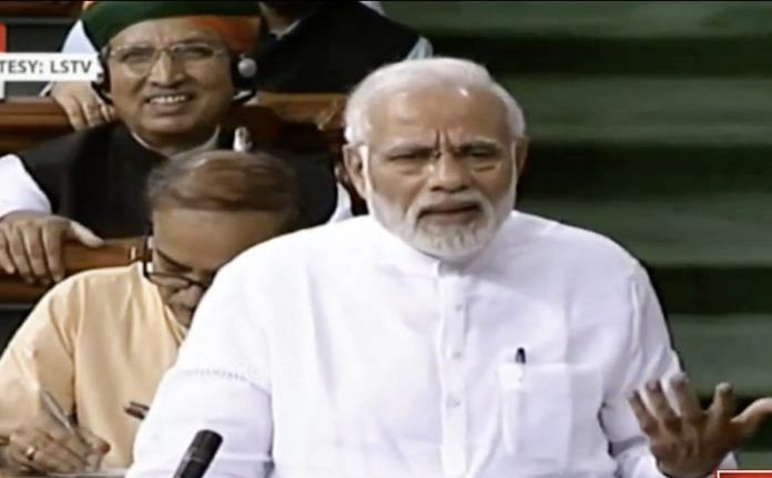 Prime Minister Narendra Modi gives his speech during the 'no-confidence motion' in Lok Sabha