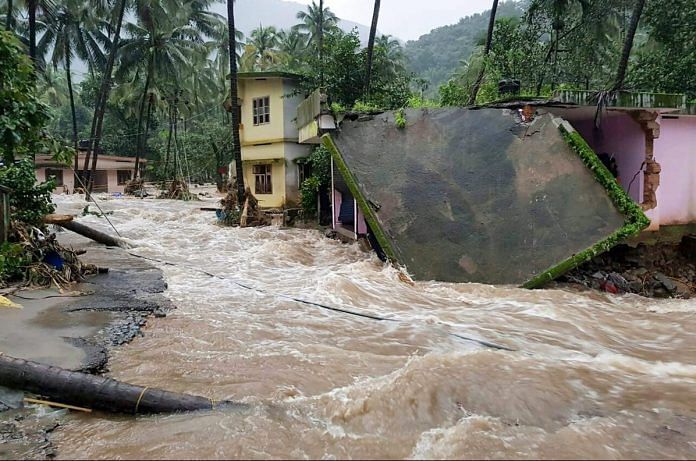 The roof of a house collapses following floods in Kerala | PTI