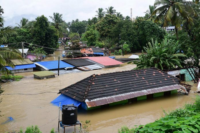 File photo | A view of houses submerged in water following a flash flood, triggered by heavy rains in Kerala | PTI Photo