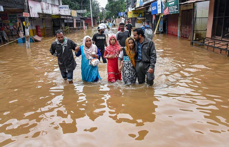 Flood-hit Kerala races to avert disease outbreak as waters recede
