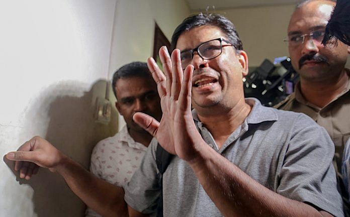 Arun Ferreira after he was arrested by the Pune police in connection with Bhima Koregaon violence case, in Mumbai | PTI