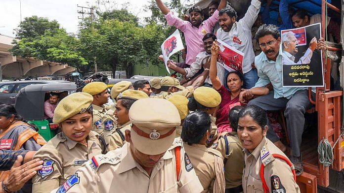 Police detain activists during a protest against the arrest of activists in connection with Bhima-Koregaon violence | PTI