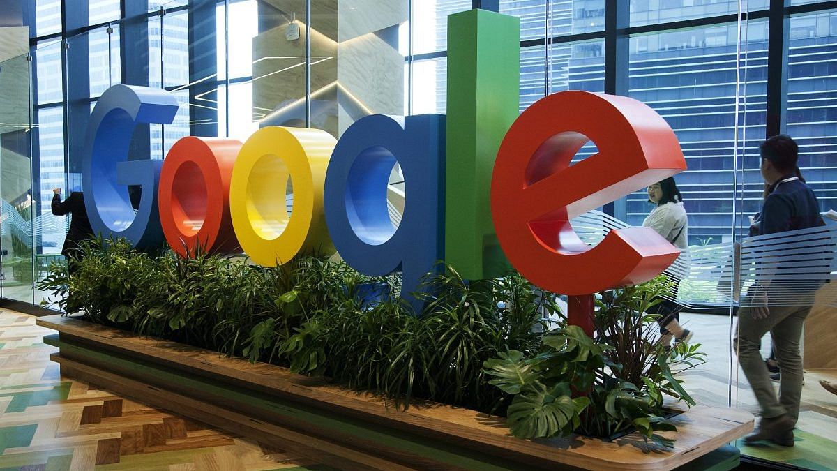 A sign featuring Google Inc.'s logo. Ore Huiying/Bloomberg
