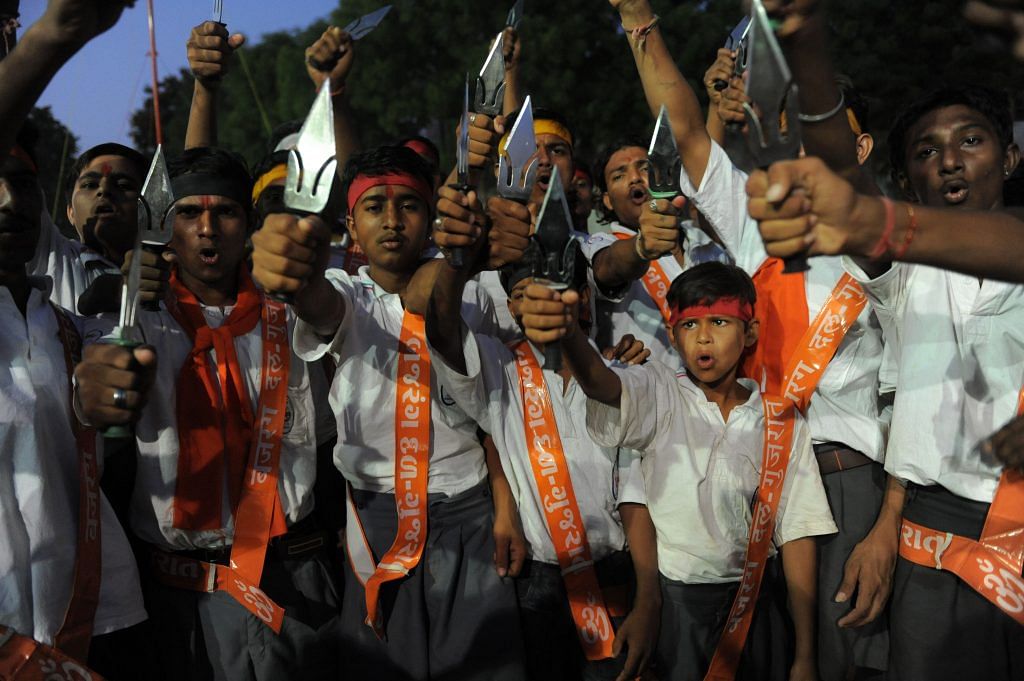 Bajrang Dal volunteers | SAM PANTHAKY/AFP/GettyImages