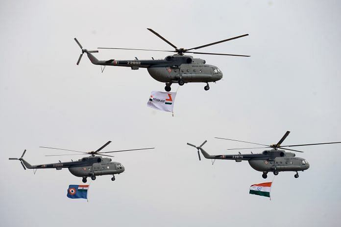 Mi17 V5 helicopters of the Indian Air Force at 'Aero India' | MANJUNATH KIRAN/AFP/Getty Images