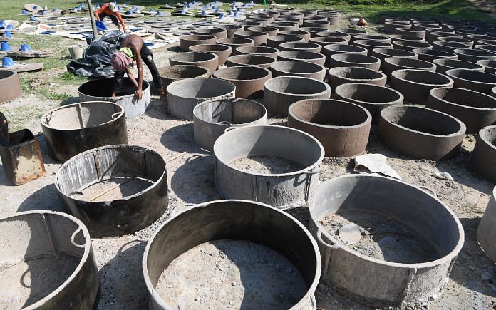 Metal moulds being made for toilet chamber rings at Cox's Bazar, Bangladesh | INDRANIL MUKHERJEE/AFP/Getty Images