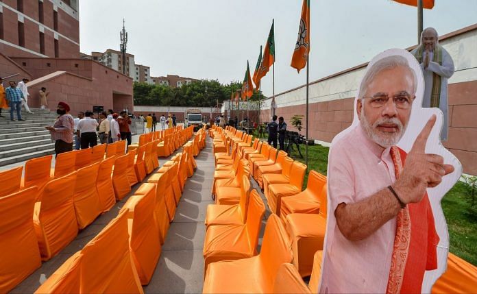 Cut-outs of Prime Minister Narendra Modi and BJP President Amit Shah at the party headquarters in New Delh