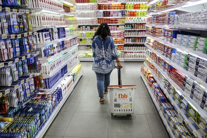 Representative image | A shopper walks through an hypermarket aisle | Dhiraj Singh | Bloomberg