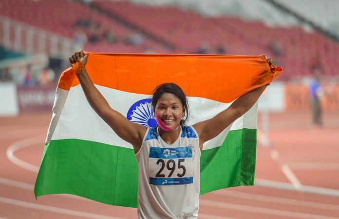 Swapna Barman celebrates after winning the gold medal in the women's Heptathlon event | PTI