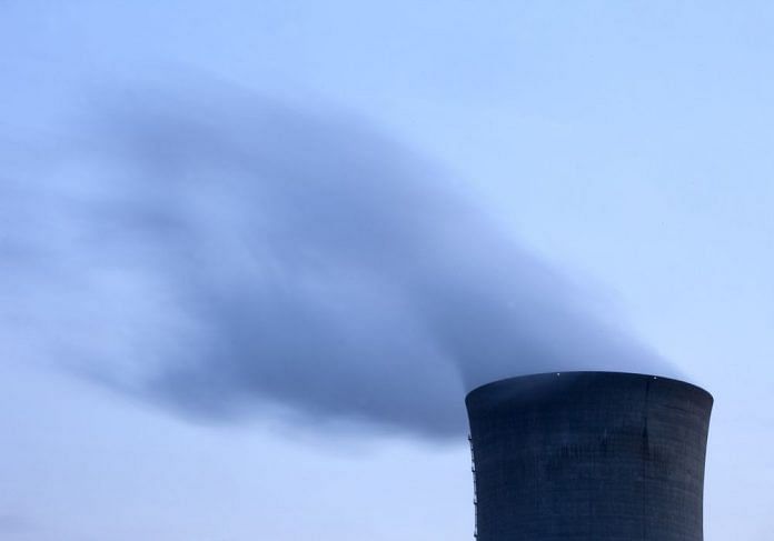 Smoke coming out from the chimney of a nuclear plant