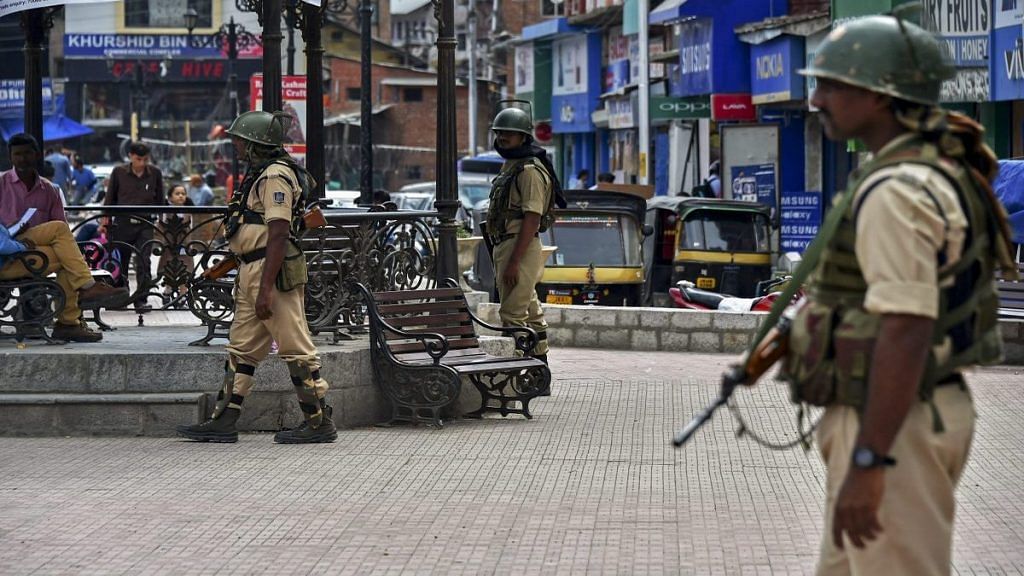 File photo of security personnel stand guard at Lal Chowk in Srinagar