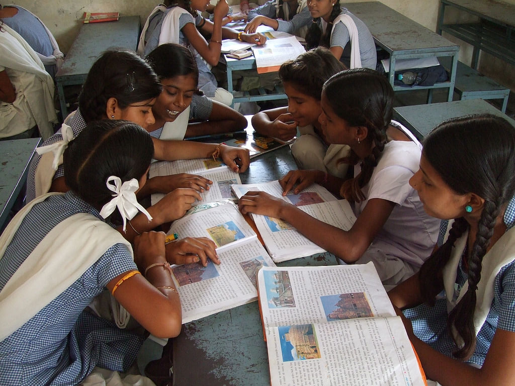 Girls studying in a school