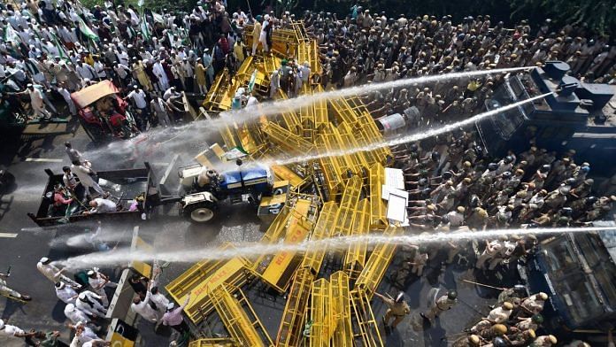 Police use water cannons to disperse farmers protesting at Delhi-UP border during 'Kisan Kranti Padyatra' Tuesday