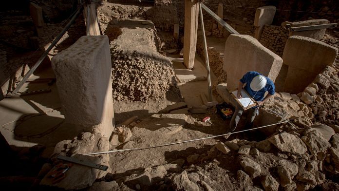 An archaeologist at work in Sanliurfa, Turkey | Getty images