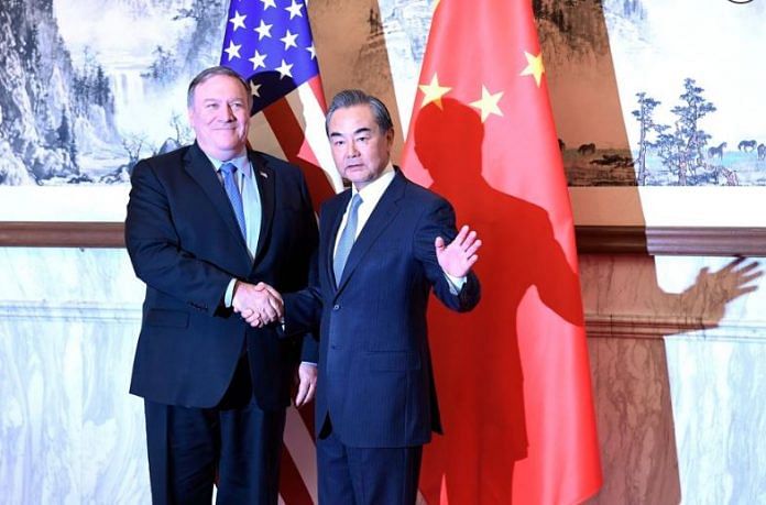 Mike Pompeo and Wang Yi in Beijing | Bloomberg