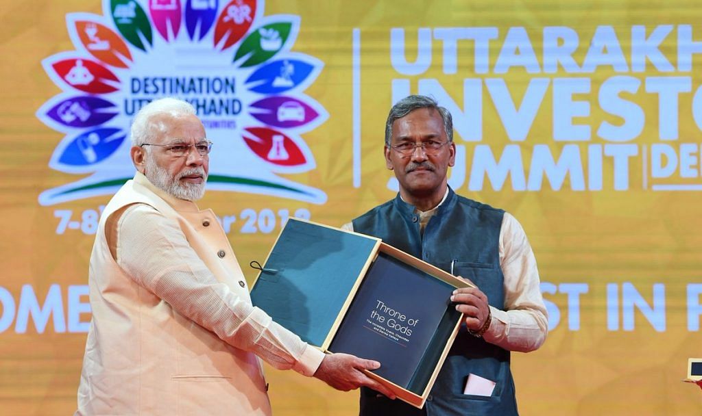 PM Narendra Modi with Uttarakhand CM Trivendra Singh Rawat at the state's first business summit