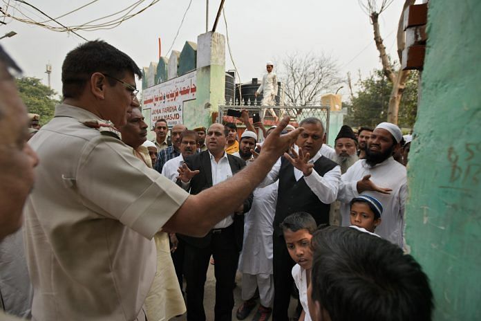 People gathered at the mosque after an eight-year-old student of a Madrasa died after he sustained a head injury | Burhaan Kinu/Hindustan Times via Getty Images