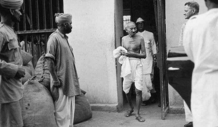 Gandhi leaves the Presidency Jail in Calcutta after interviewing political prisoners | Keystone/Getty Images