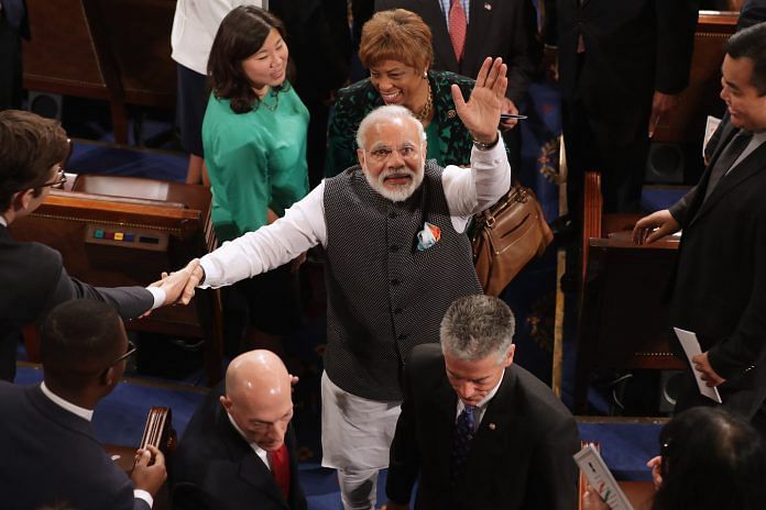Prime Minister Narendra Modi shakes hands with members of Congress, US | Chip Somodevilla/Getty Images