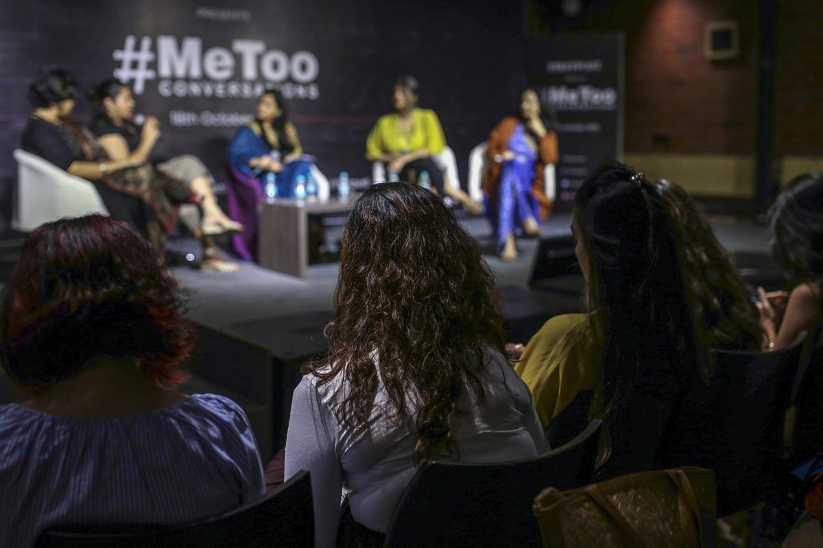 Attendees listen to a panel discussion at a #MeToo event in Mumbai | Dhiraj Singh/Bloomberg